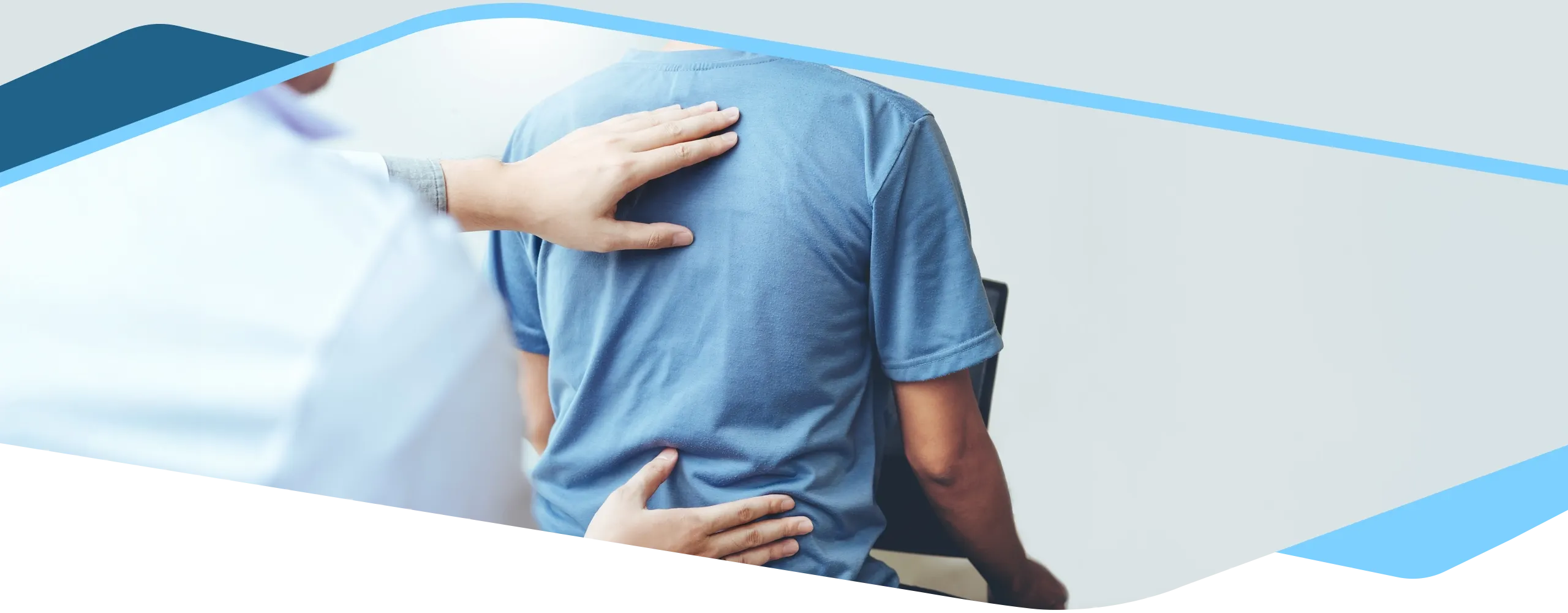 Chiropractor performing a back exam.